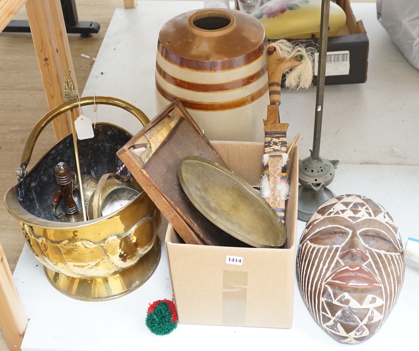 A dagger, various copper and brass wares, A Victorian helmet shaped coal scuttle and other metalware, and a An ecclesiastical incense stand, height 62cm